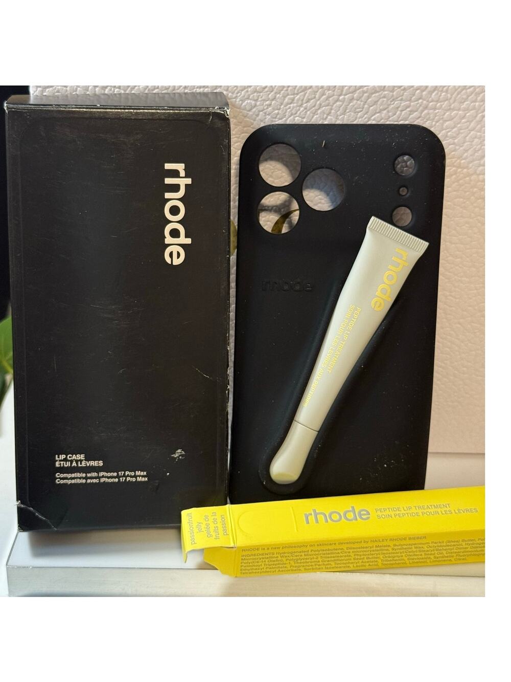 Black Rhode phone case paired w Rhode Peptide Lip Tint in Passionfruit Jelly-NEW